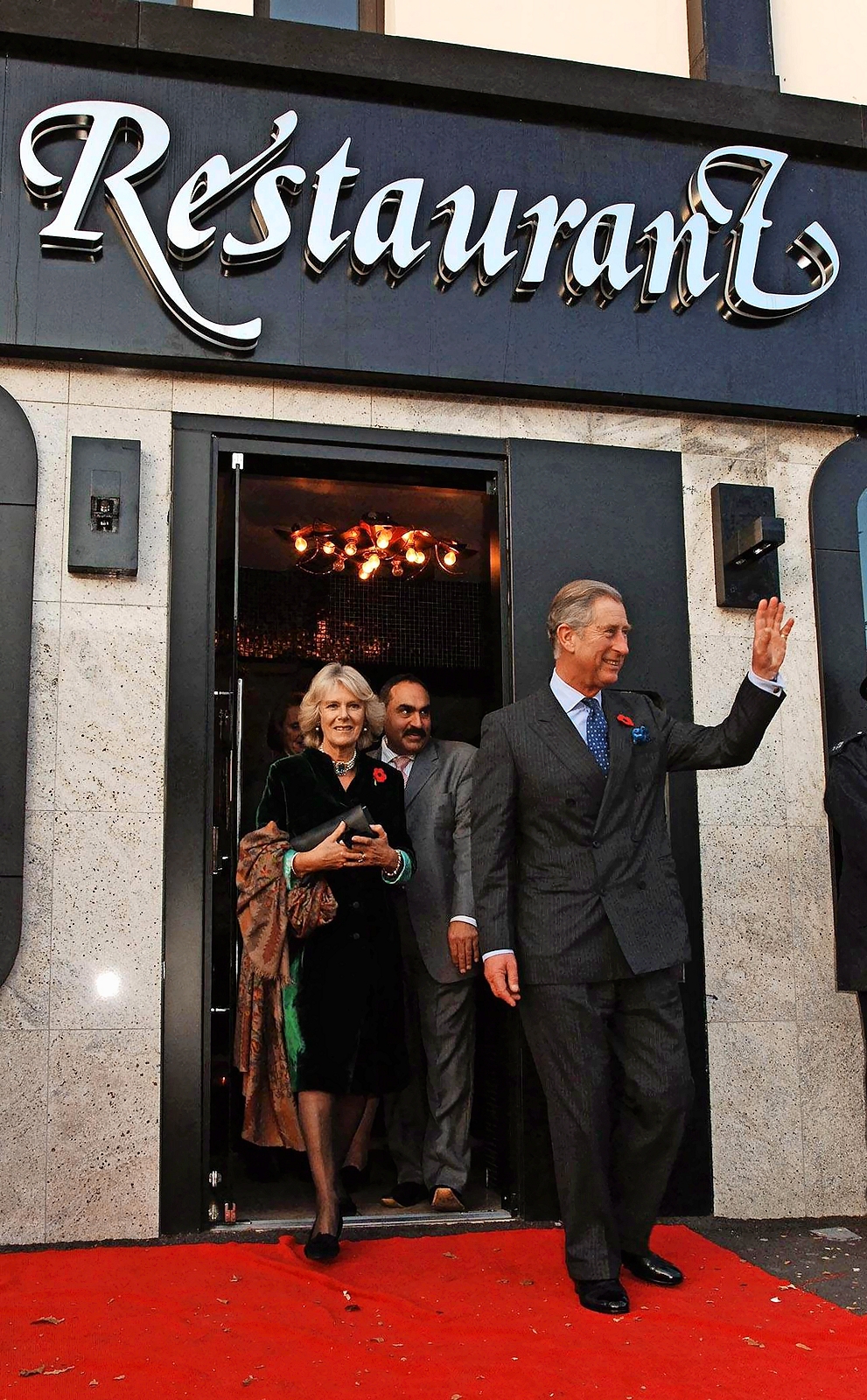 Prince Charles and Camilla, Duchess of Cornwall, leaving a restaurant.